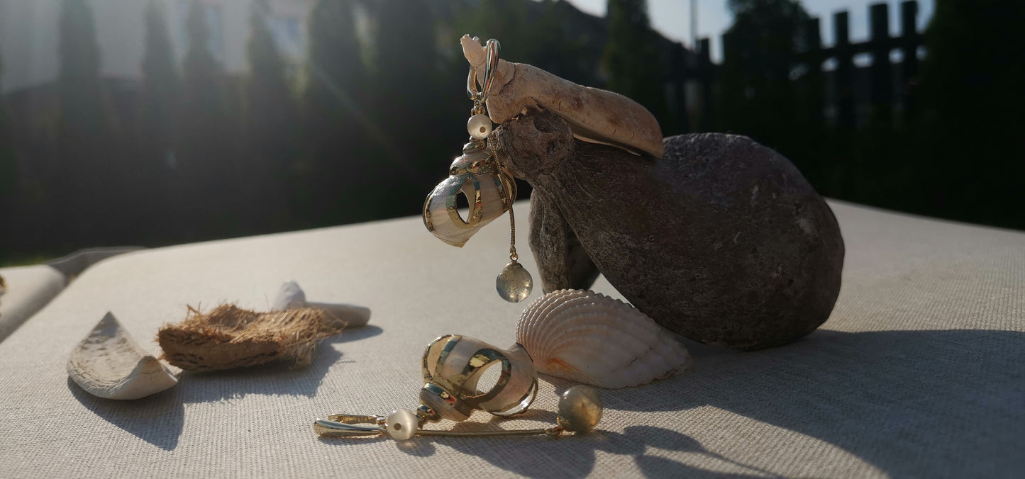 Earrings from natural shell with labrador